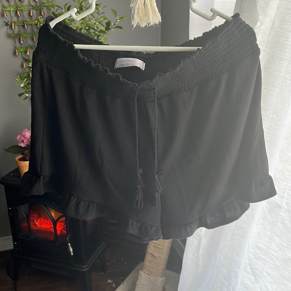 Women’s black ruffled shorts